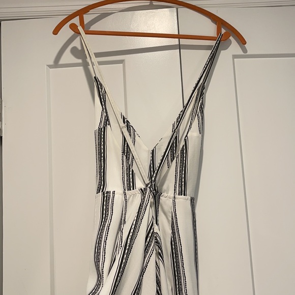 White and black open back slit legs jump suit!! - Picture 2 of 2